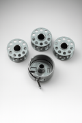 Set of 4 Metal Sewing Machine Bobbins with Bobbin Case